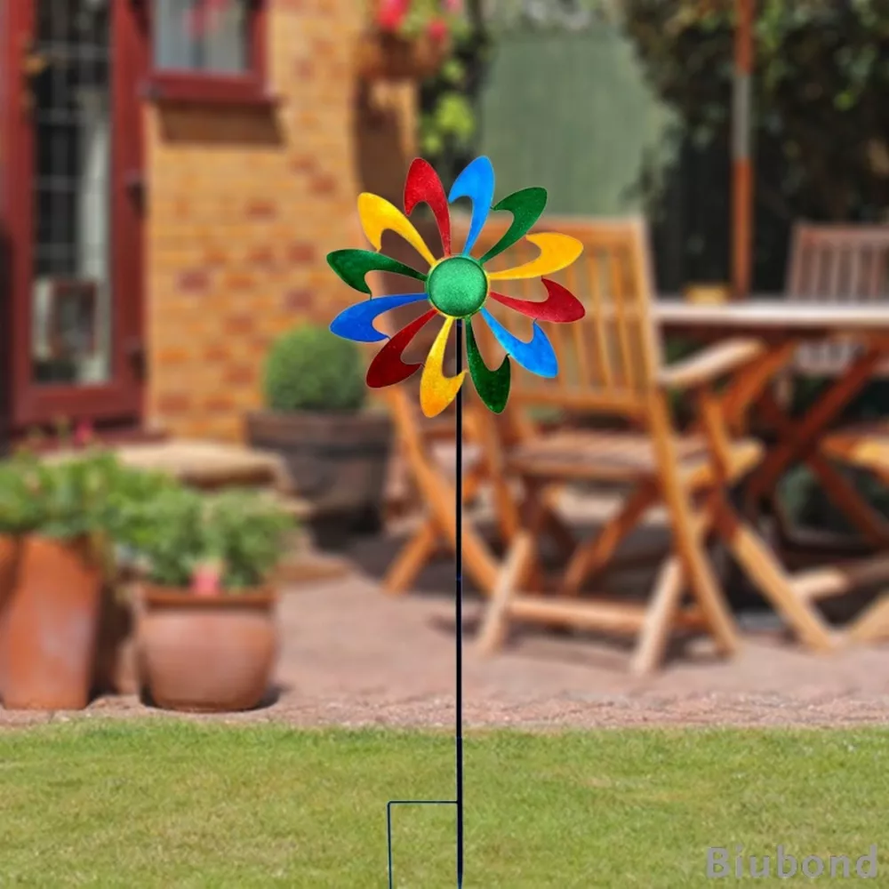 Using A Metal Windmill In Your Yard Art To Add A Touch Of Whimsy
